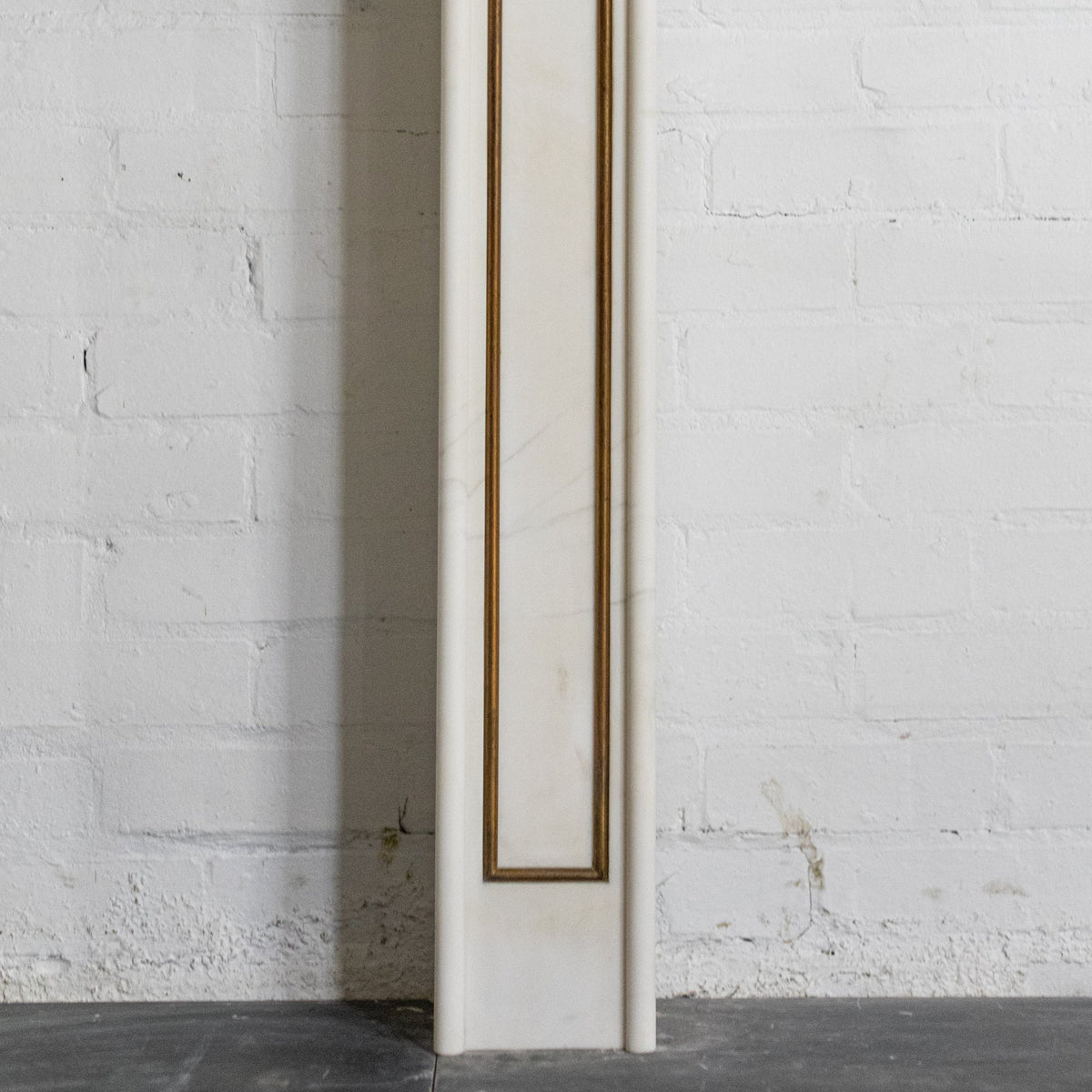 Reclaimed Statuary Marble Fireplace Surround with Brass Detail | The Architectural Forum
