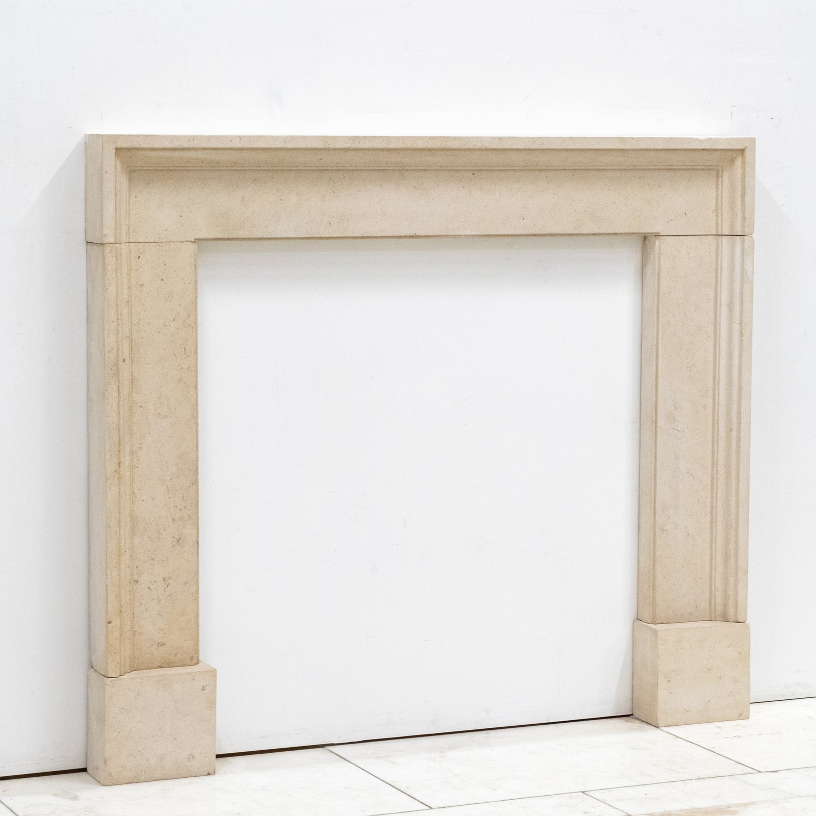 Reclaimed Sand Stone Bolection Fireplace Surround | The Architectural Forum