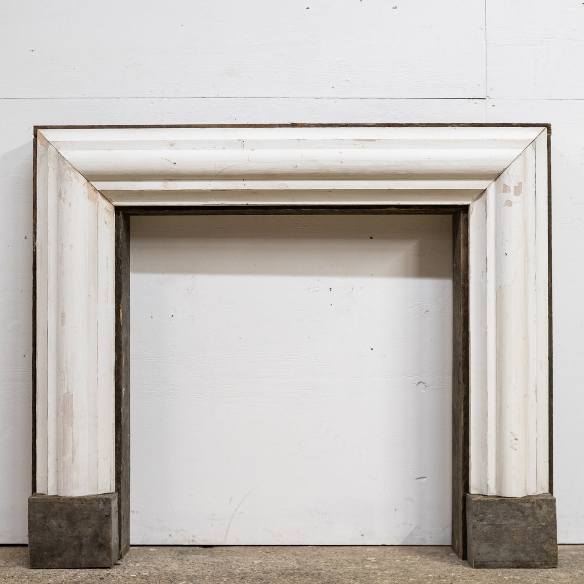 Bolection Fireplace Surround Crafted from Reclaimed Timber | The Architectural Forum