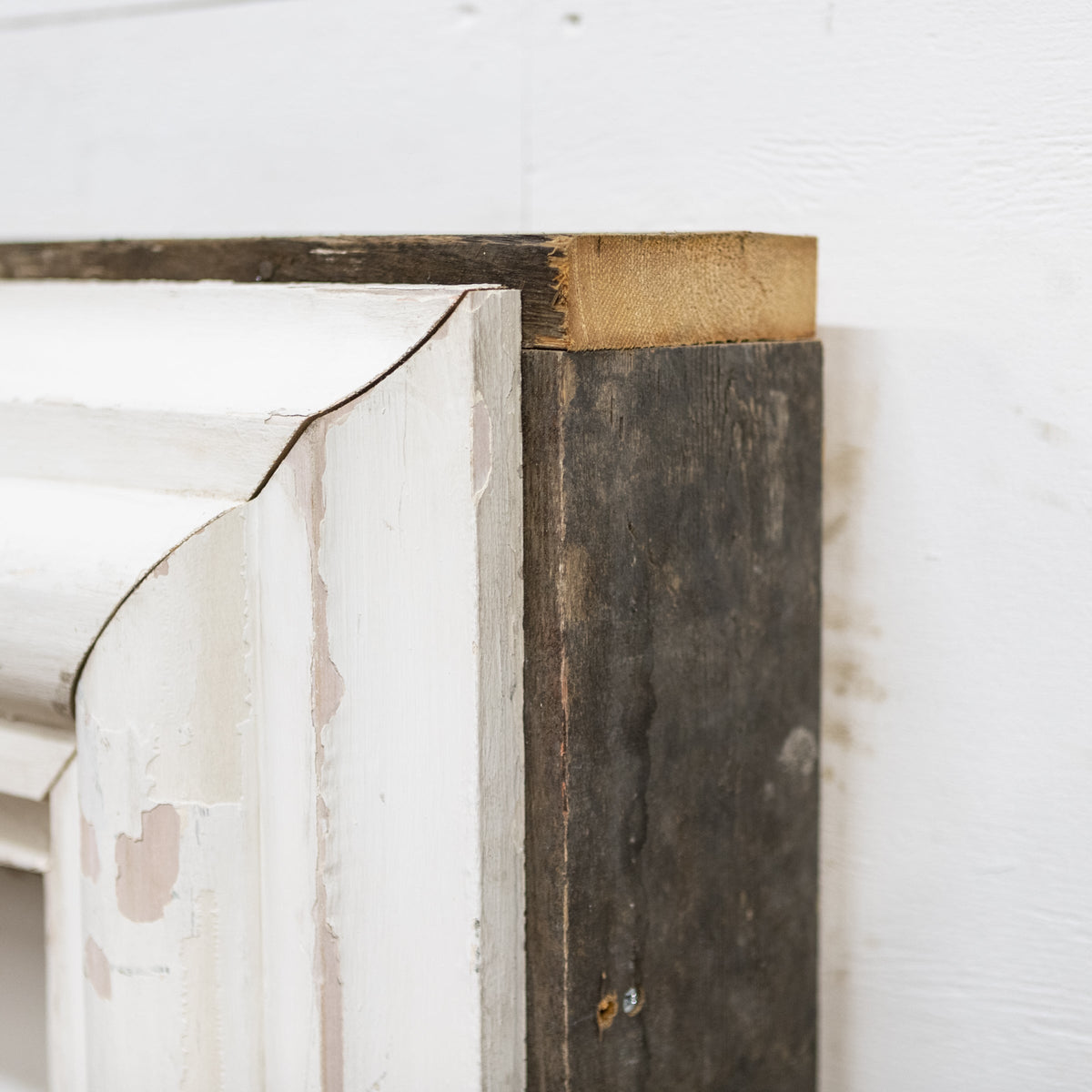 Bolection Fireplace Surround Crafted from Reclaimed Timber | The Architectural Forum