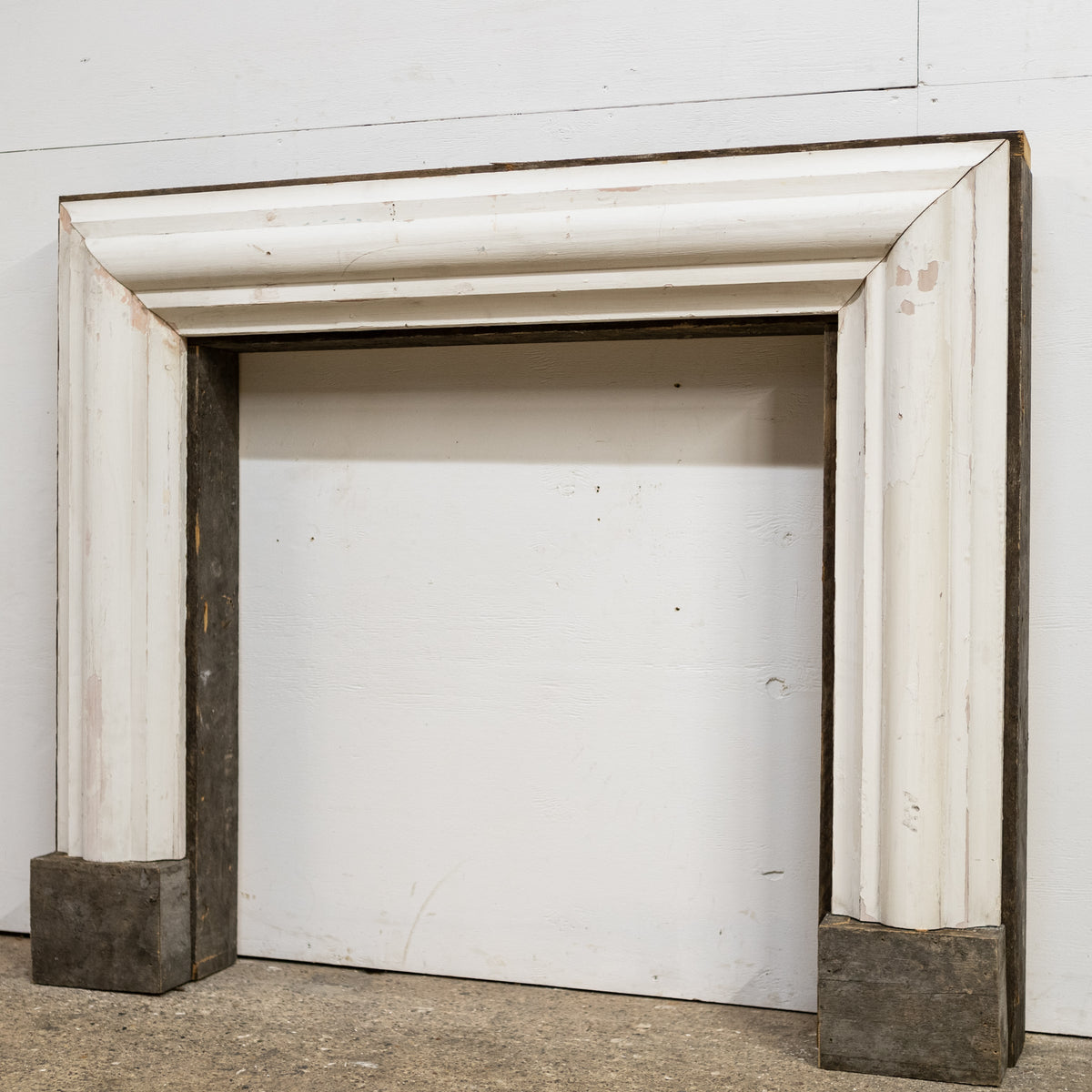 Bolection Fireplace Surround Crafted from Reclaimed Timber | The Architectural Forum