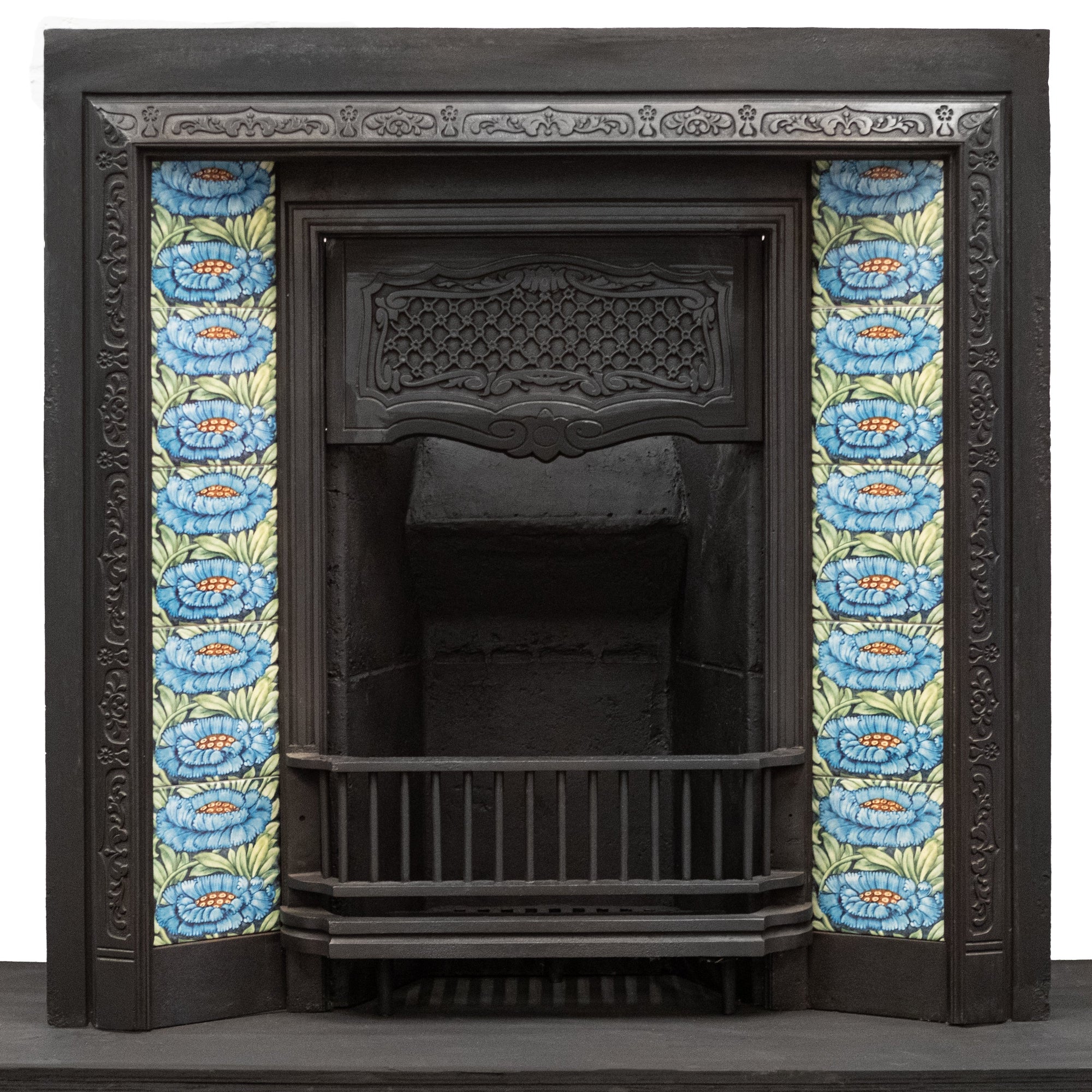Antique Cast Iron Insert with Blue Floral Tiles | The Architectural Forum