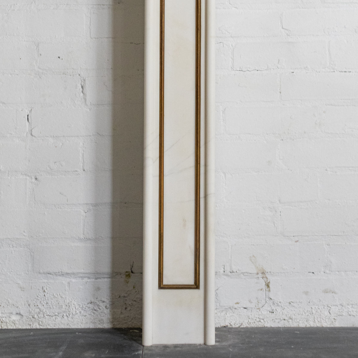 Reclaimed Statuary Marble Fireplace Surround with Brass Detail | The Architectural Forum