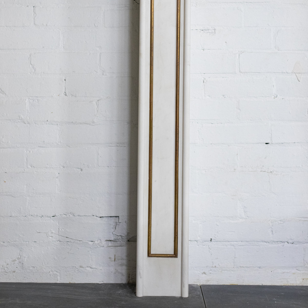 Reclaimed Statuary Marble Fireplace Surround with Brass Detail | The Architectural Forum